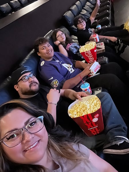 Agueda and her family at the movies
