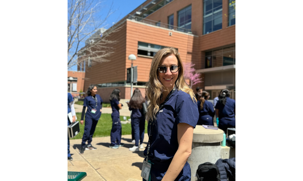 Eirini Bouitou in front of a campus building