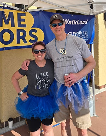 Becky Grubb and her doctor, Wells Messersmith, MD, at a colorectal cancer run/walk benefit.