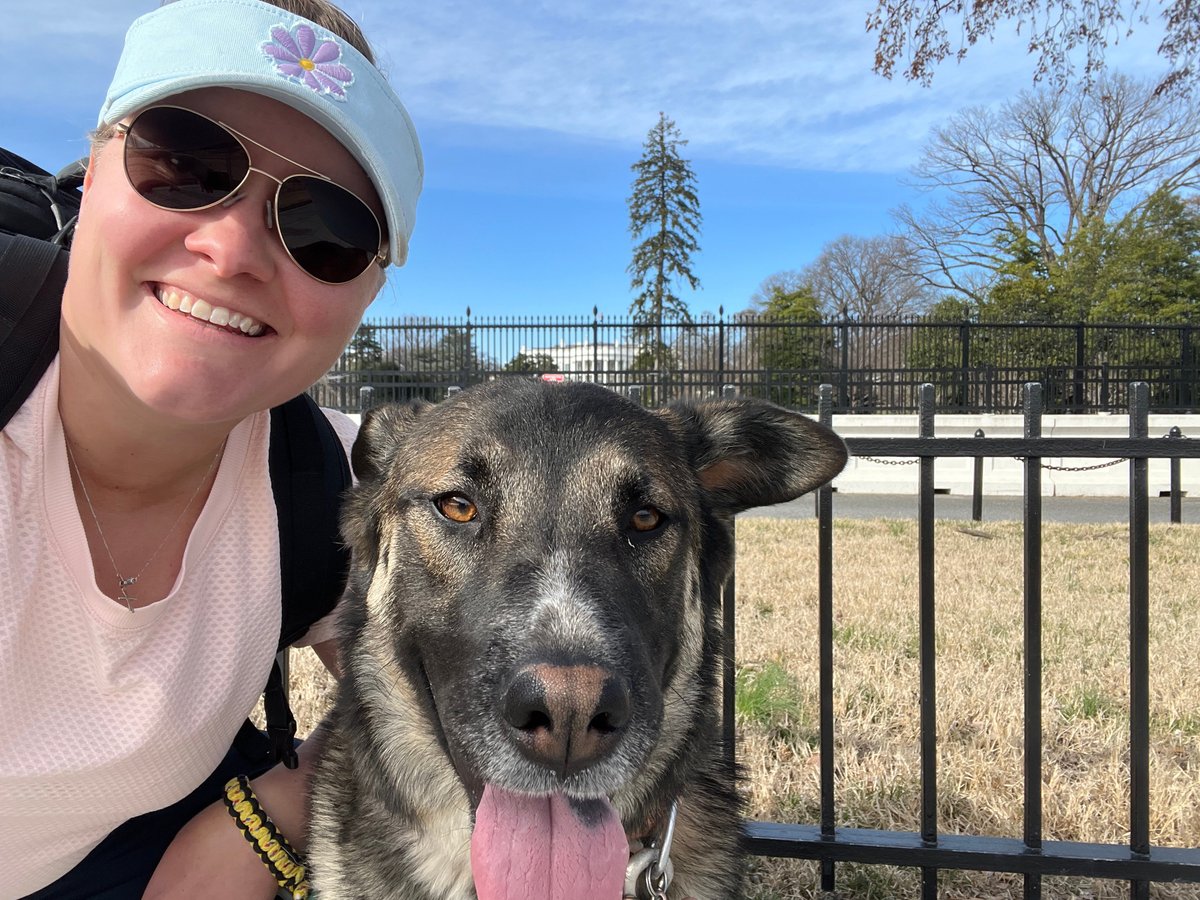 Maddie and her service dog, Tigger