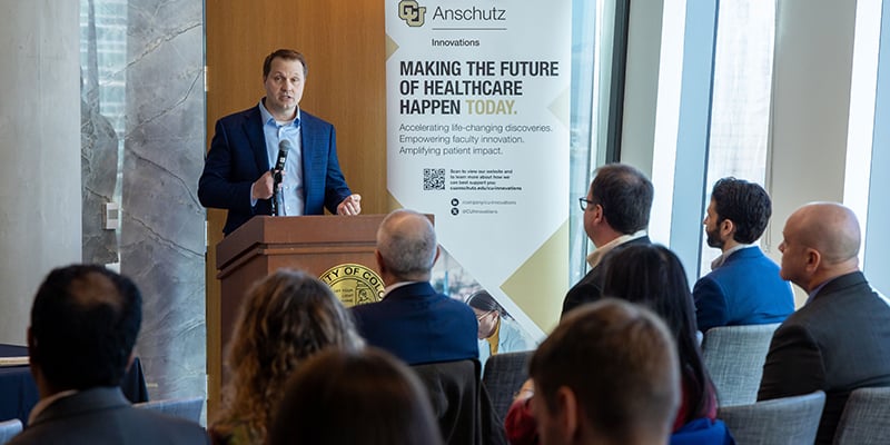 Jim Peichel, chief technology officer of Medtronic, speaks at the strategic research agreement announcement