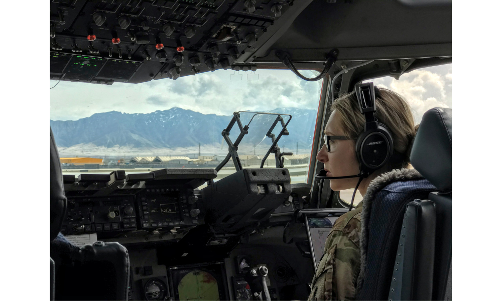 woman in cockpit of Air Force plane