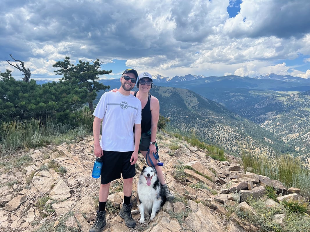 Taylor and wife, Allie, with their dog, Milla, on a hiking trip